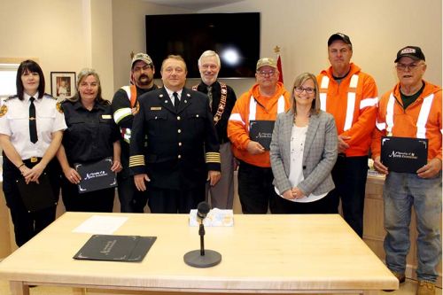 North Frontenac honoured long service of employees and fire volunteers at its regular meeting last week including Bill Hermer and Gregg Wise (20 years), Tim Neal (not in picture) and Dean Salmond (15 years), Tara Mieske, Randy Schonauer and Eric Korhonen (10 years) and fire volunteers Kevin Wheeler (Snow Road, 25 years, not in picture), Michelle Ross (Ompah, 10 years), Donna Schonauer (Clar-Mill, 10 years). Also pictured is Mayor Ron Higgins. Photo/Craig Bakay
